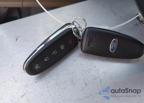 2016 Ford Escape Titanium z USA, uszkodzony, nr VIN 1FMCU0J91GUA39760